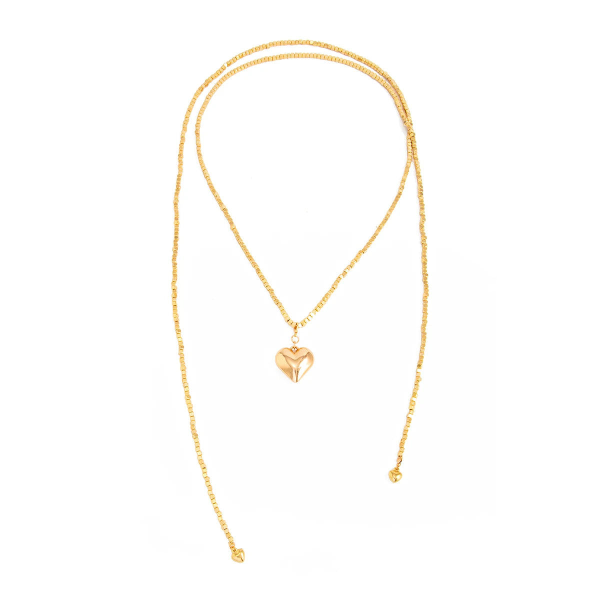 Layered gold-tone necklace featuring pearl elements and a heart pendant, designed for versatile styling.