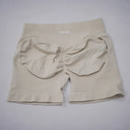 Beige LOVORA™ Sculpt & Lift Seamless High-Waisted Gym Shorts with a scrunch-butt design and wide waistband for tummy control.