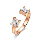 Adjustable rose gold ring featuring two princess-cut Moissanite stones set in a minimalist design.