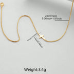 18K gold plated minimalist cross necklace with a delicate chain, showcasing a high-polish micro cross pendant.