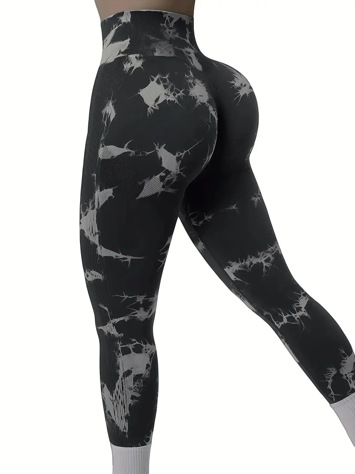High-waisted seamless leggings in a black and gray tie-dye pattern with a scrunch butt detail, perfect for workouts.