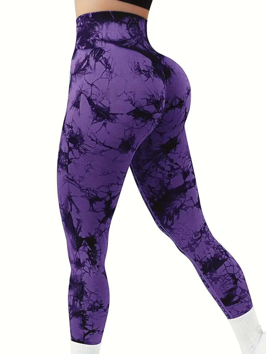Purple tie-dye leggings with a scrunch butt design and high-rise waistband, showcasing a stylish gradient pattern.