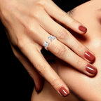 Adjustable LOVORA™ Aura Princess Cut ring featuring a square Moissanite stone, displayed on a model's hand with polished nails.