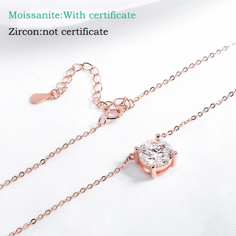 Round-cut Moissanite pendant necklace in rose gold finish with a delicate chain, showcasing a minimalist design.