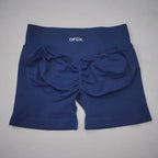 High-waisted navy gym shorts with a scrunch-butt design and wide waistband for enhanced comfort and fit.