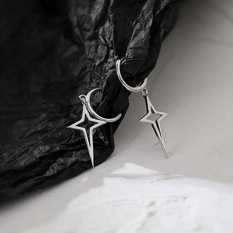 Gothic Cyber-Punk Hollow Star Drop Earrings feature a metallic dark silver tone in an asymmetric star design with cross drops.