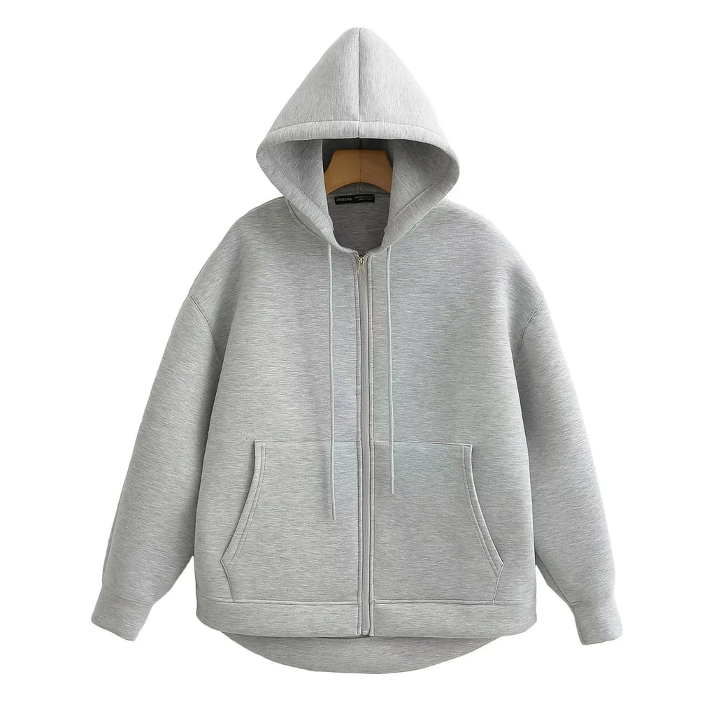 Gray oversized zip-up hoodie with a double-layered hood, ribbed cuffs, and front kangaroo pockets.