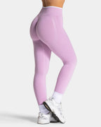 High-waisted seamless leggings in light purple with a contour design, featuring a supportive waistband and stylish fit.