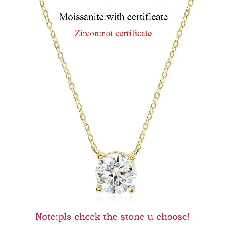 Round-cut Moissanite pendant necklace with yellow gold chain. Minimalist design featuring a secure crown-setting.
