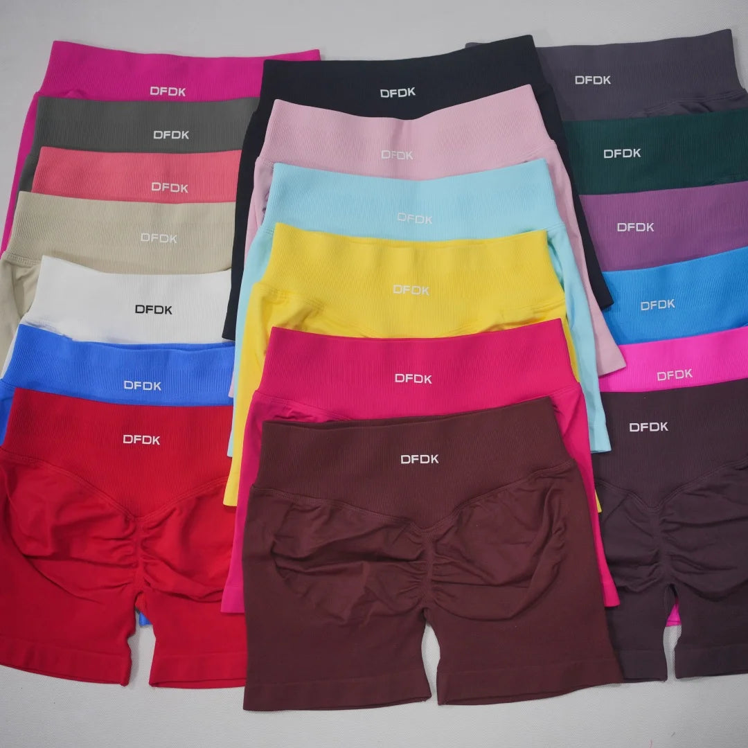 Colorful array of LOVORA™ Seamless High-Waisted Gym Shorts featuring a scrunch-butt design, available in various shades.