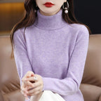 Lavender turtleneck sweater made from soft merino wool and cashmere blend, featuring a relaxed fit and ribbed trims.