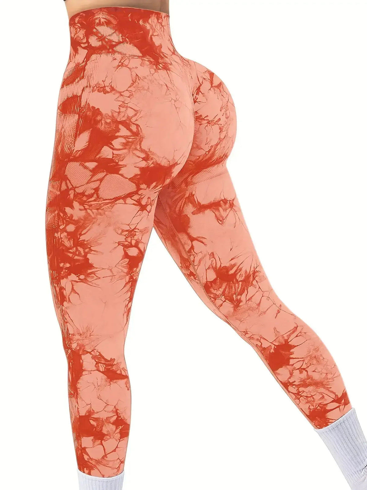 Premium tie-dye leggings in shades of coral with a seamless fit, scrunched design enhancing the shape, high-rise waistband.