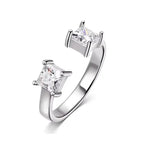 Adjustable LOVORA™ Aura Princess Cut Ring in platinum silver features two square Moissanite stones set in a sleek, minimalist band.