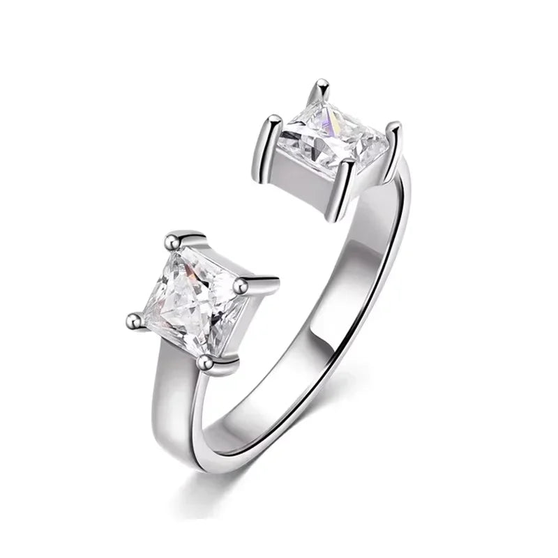 Adjustable LOVORA™ Aura Princess Cut Ring in platinum silver features two square Moissanite stones set in a sleek, minimalist band.