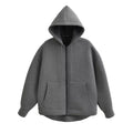 Gray oversized zip-up hoodie with a double-lined hood, drop shoulders, and front kangaroo pockets.