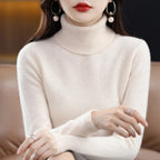 Cream-colored LOVORA™ Premium Merino Wool & Cashmere Turtleneck Knitwear with a relaxed fit and ribbed cuffs.