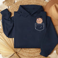 Cozy navy oversized hoodie featuring an embroidered Bubu and Dudu bear graphic on the pocket.