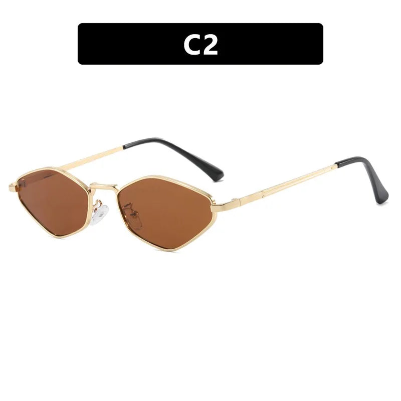 Polygonal sunglasses with brown lenses, gold metal frame, and black temple tips for a trendy Y2K look.