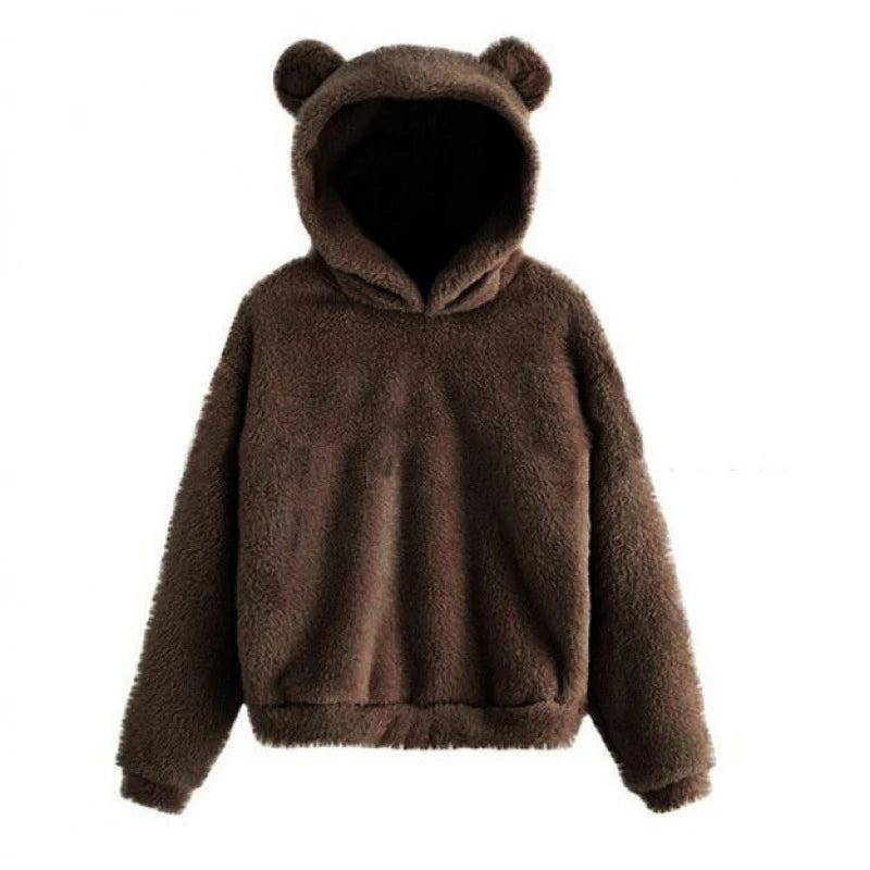 Cozy oversized hoodie in rich brown teddy fleece with playful bear ears on the hood and a relaxed fit.