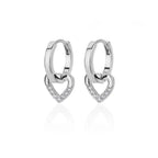 Chunky huggie earrings featuring a dropped heart design with enamel and shimmering accents in a polished silver finish.
