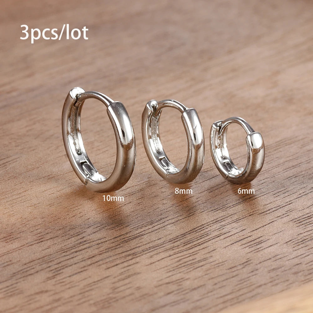 Three-piece earring set featuring high-polish geometric drop earrings in varying sizes: 6mm, 8mm, and 10mm.