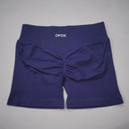 Navy blue seamless high-waisted gym shorts with a scrunch butt design and a wide elastic waistband.