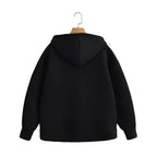 Oversized black hoodie with a double-layered hood, drop-shoulder design, and ribbed cuffs.