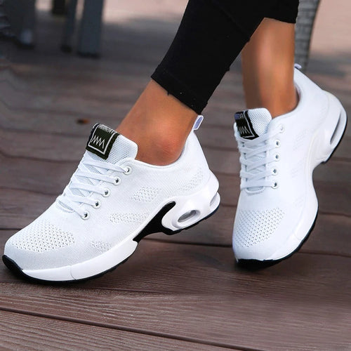 White LOVORA™ Aura Air Boost Platform Sneakers with breathable mesh upper, black outsole, and transparent air-cushion chamber.
