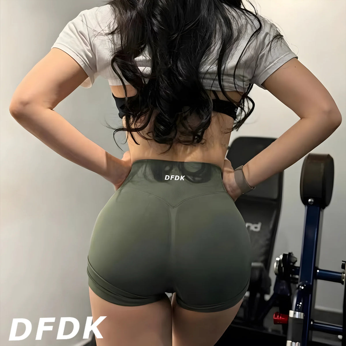 High-waisted, olive green gym shorts with a scrunch-butt design, featuring a wide waistband for secure fit and tummy control.