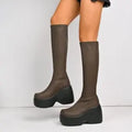 Gothic Matrix Ultra-Chunky Platform Boots in brown eco-leather with a high curved block heel and sleek ankle fit.