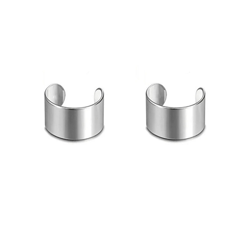 Chunky minimalist hoop earrings in high-gloss silver finish with a hollow tubular design.
