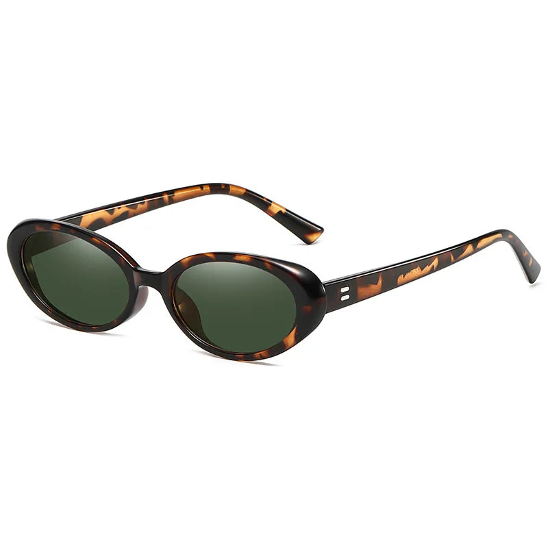 Vintage oval sunglasses with a black and tortoiseshell frame and green lenses, featuring a sleek minimalist design.