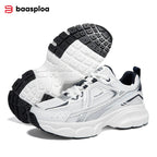 Chunky white sneakers featuring a breathable mesh upper with silver accents and a thick, sculpted black and white sole.