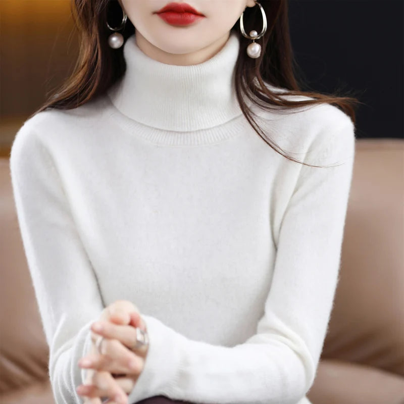 White LOVORA™ Premium Merino Wool & Cashmere Turtleneck Knitwear with a relaxed high collar, styled casually.