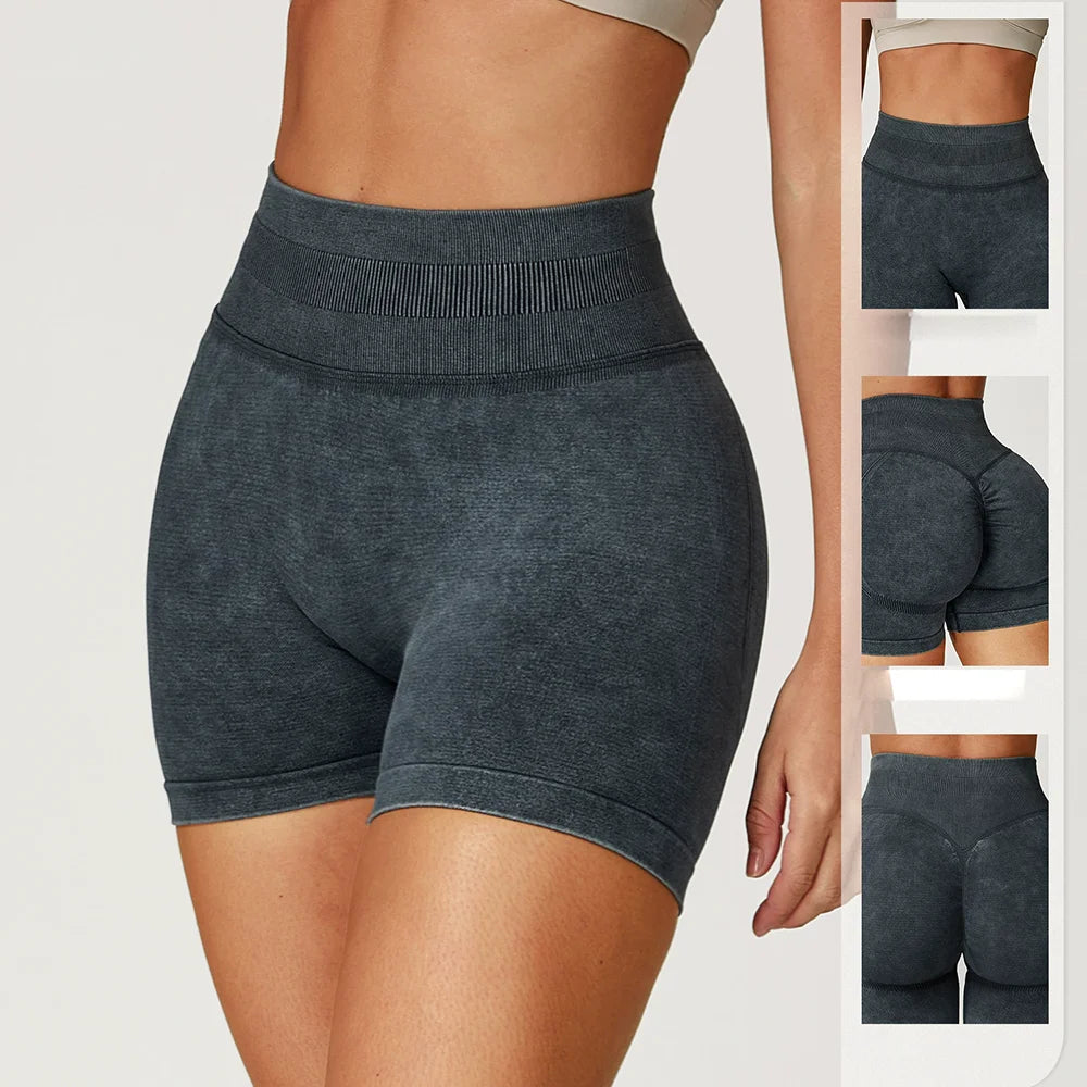 High-waisted grey shorts with a sand-washed texture, featuring a supportive waistband and seamless design for comfort.