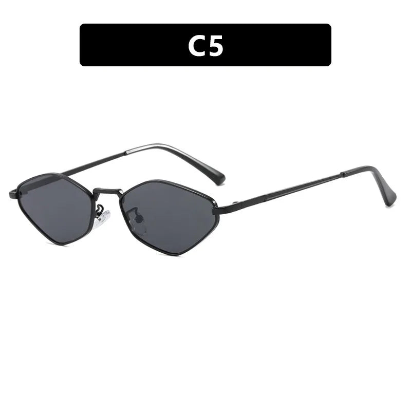 Sleek black LOVORA™ Aura diamond-cut polygonal sunglasses featuring multi-angled lenses and slim metallic temples.