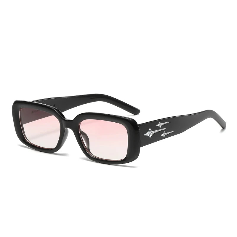 Black Y2K sporty sunglasses with a wrap-around design, pink tinted lenses, and silver star accents on the temples.
