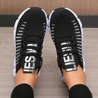 Black LOVORA™ Aura Breathable Knitted Performance Sneakers with white text, featuring a slip-on design and elastic laces.