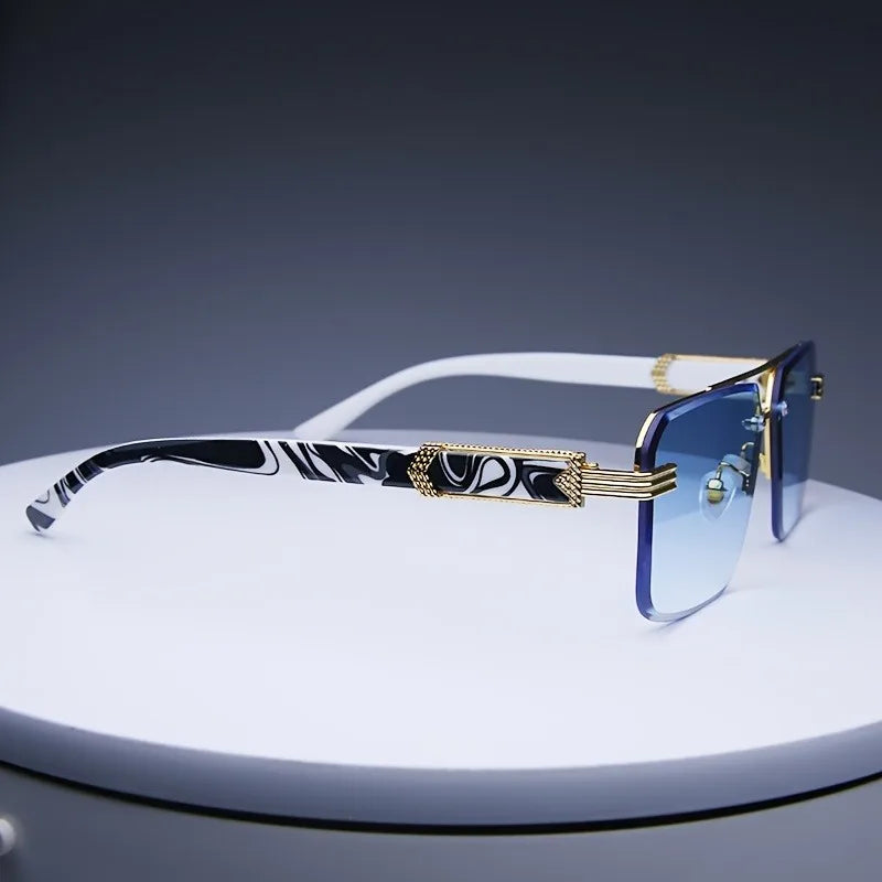 Rimless classic square sunglasses with blue gradient lenses and black and white marbled temples, accented with gold-tone hinges.