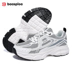 Chunky white sneakers with a tech streetwear style, featuring breathable mesh panels and a thick sculpted rubber sole.