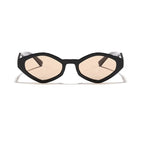 Bold cat-eye sunglasses with a thick black frame and light brown tinted lenses, designed for a stylish retro look.